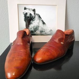 Salvatore Ferrangamo vintage tangerine mottled loafers.